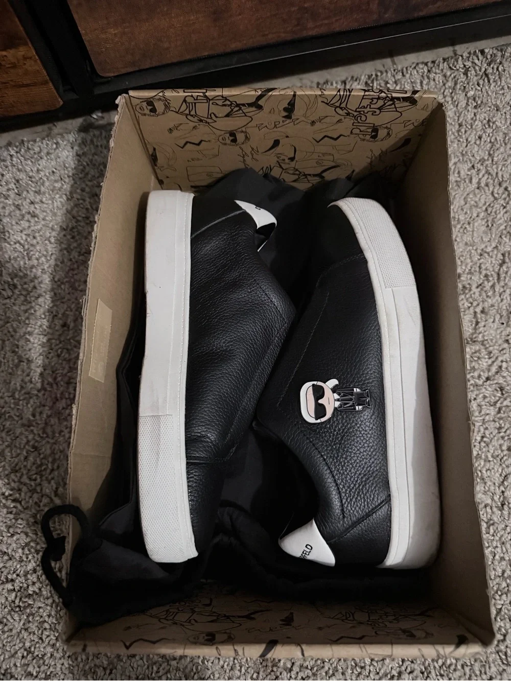 Karl Lagerfeld Black Leather Slip-On Sneakers with White Sole and Heel Tab